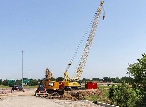 A crane and other construction equipment