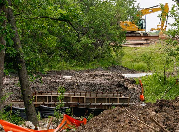 Construction of a bridge on the Michigan side of the new trail