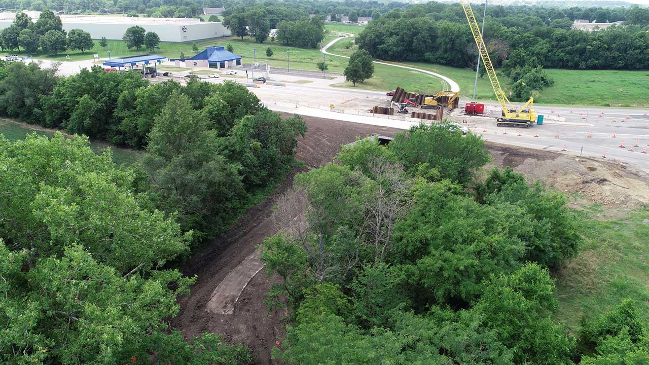 Overlooking where the bridge will cross a creek, looking west