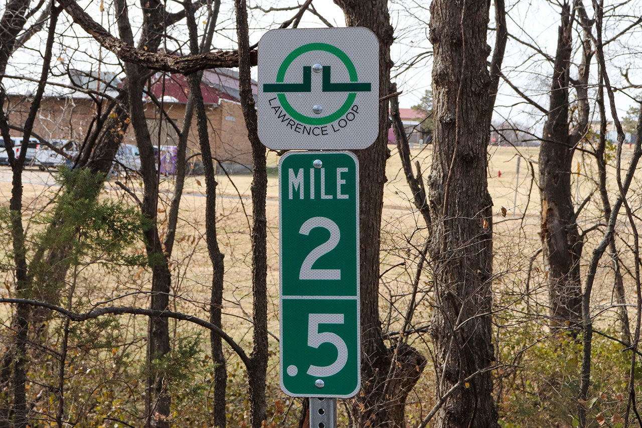 The Lawrence Loop Mile Marker 2.5, located along the Haskell Trail south of 23rd Street