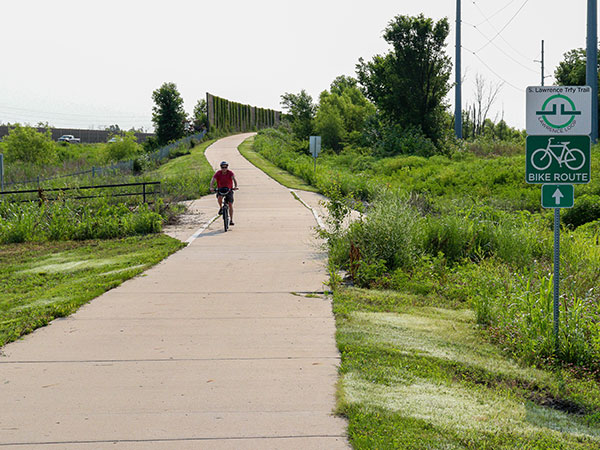 A person biking on the Lawrence Loop, Segment 4