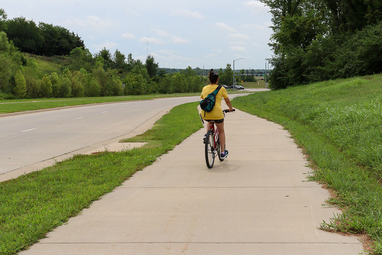 A person biking along the Loop on Haskell