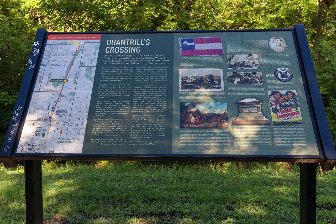 A historical panel about Quantrill's Raid located on the trail