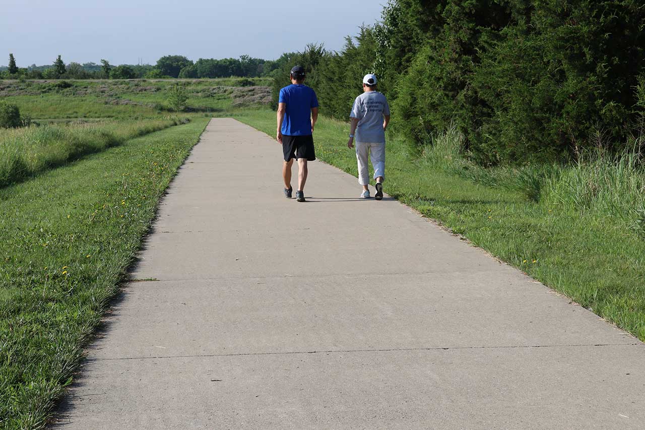 A couple walking on the loop near 6th Street
