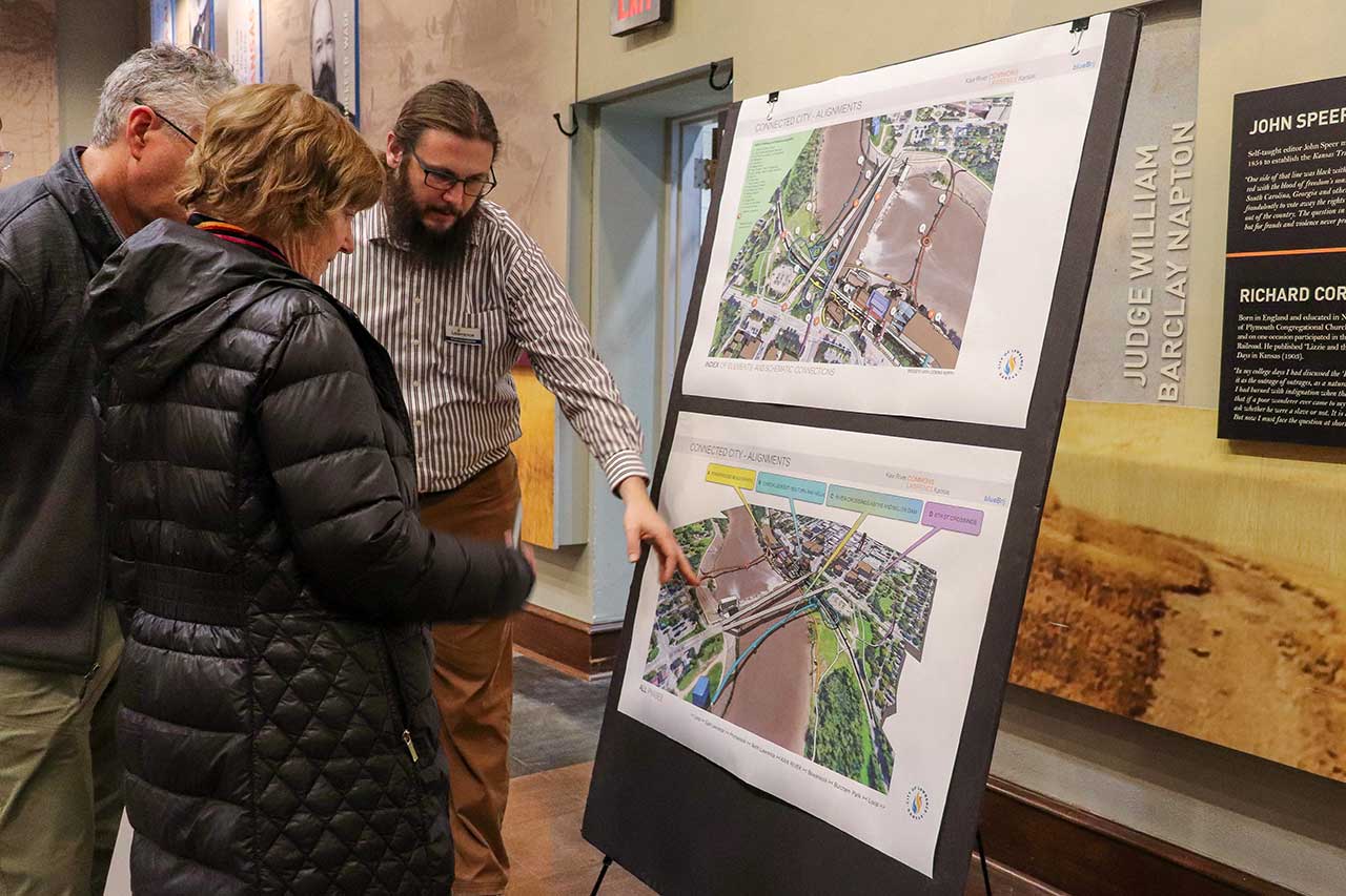 People at the Open House looking at the displays