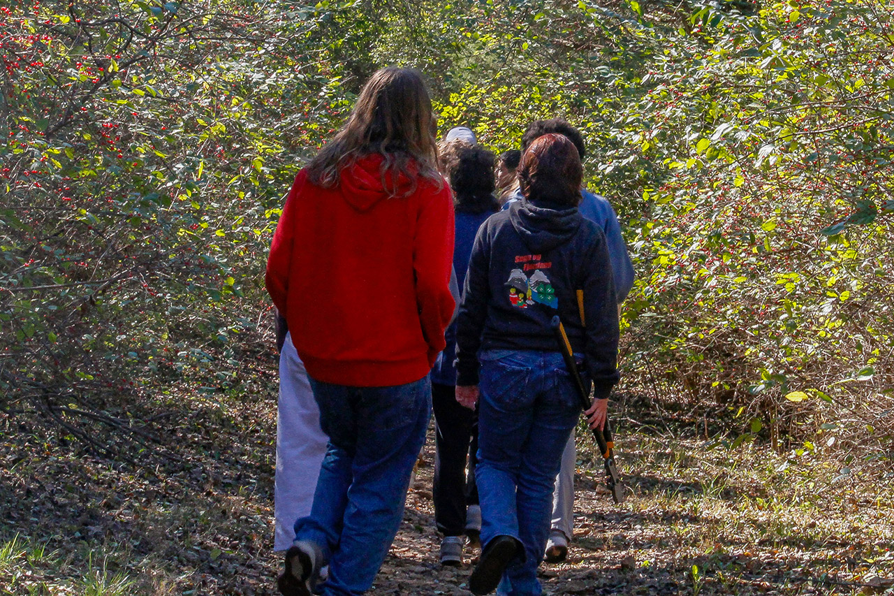 Students walking the trail to begin their work