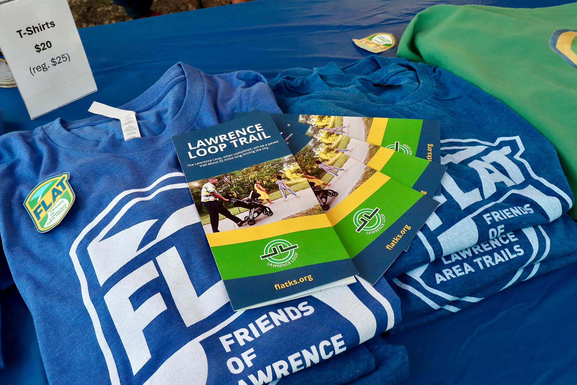 FLAT t-shirts and trail brochures