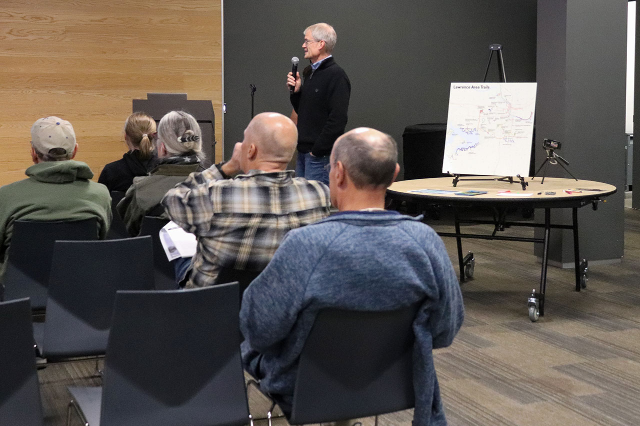 chris tilden speaking at the cameron's bluff open house