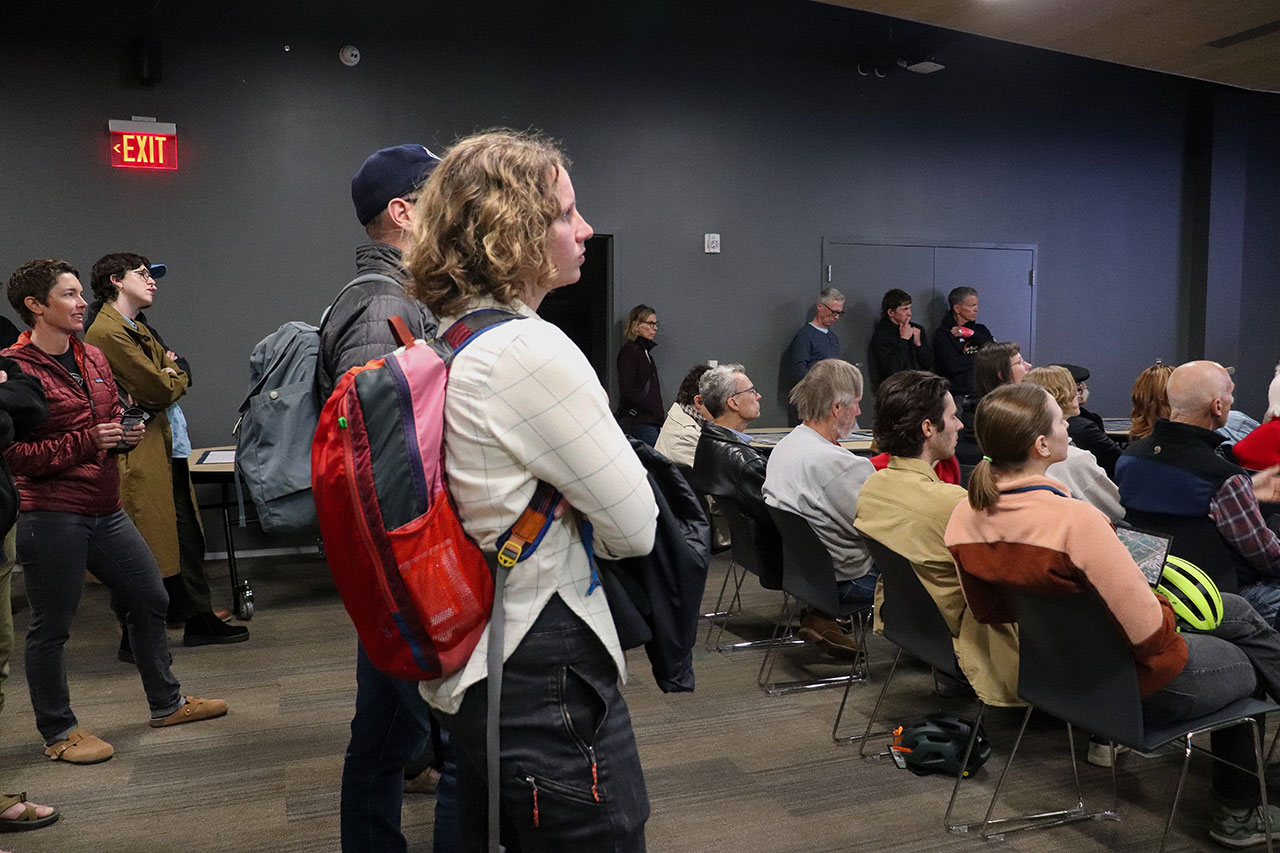 people listing to the presentation at the cameron's bluff open house