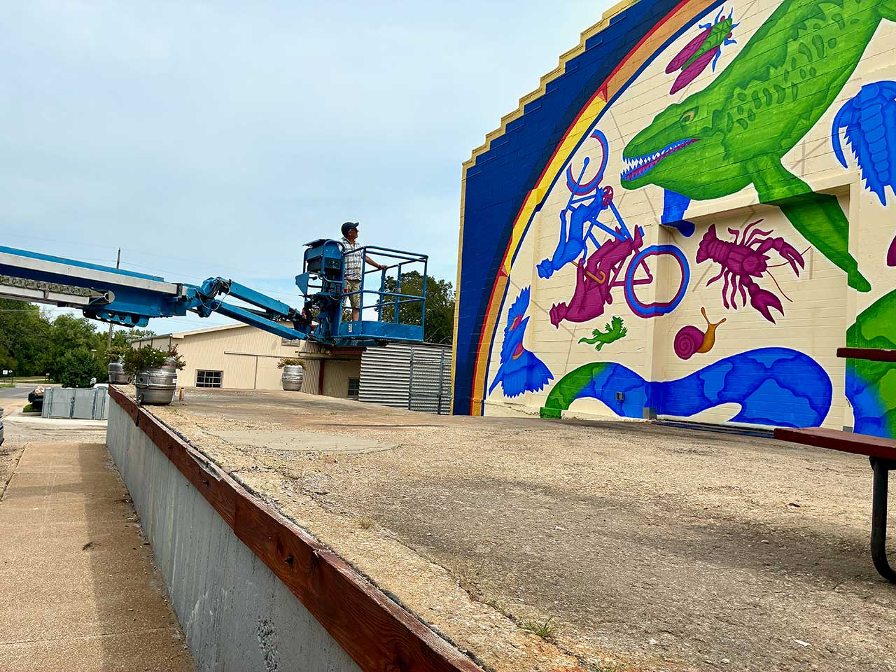 Dave Lowenstein inspecting his work on the mural