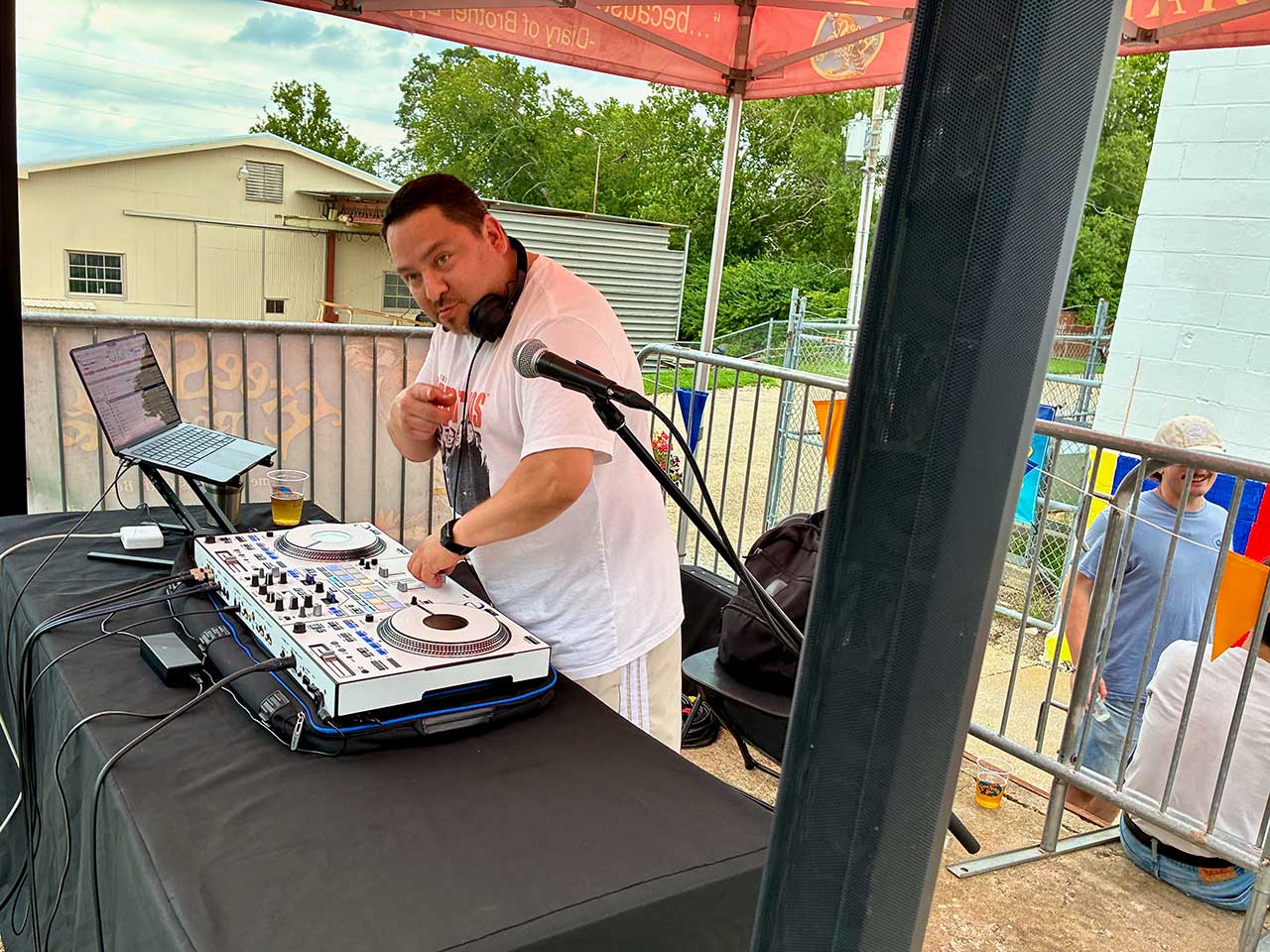 DJ Proof performing at the painting kick off party