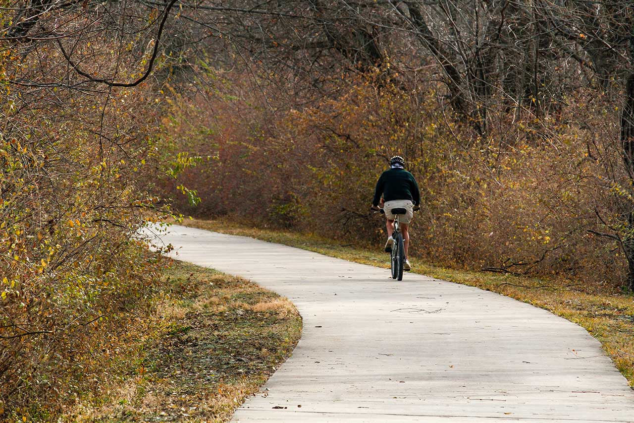 A person riding on the trail